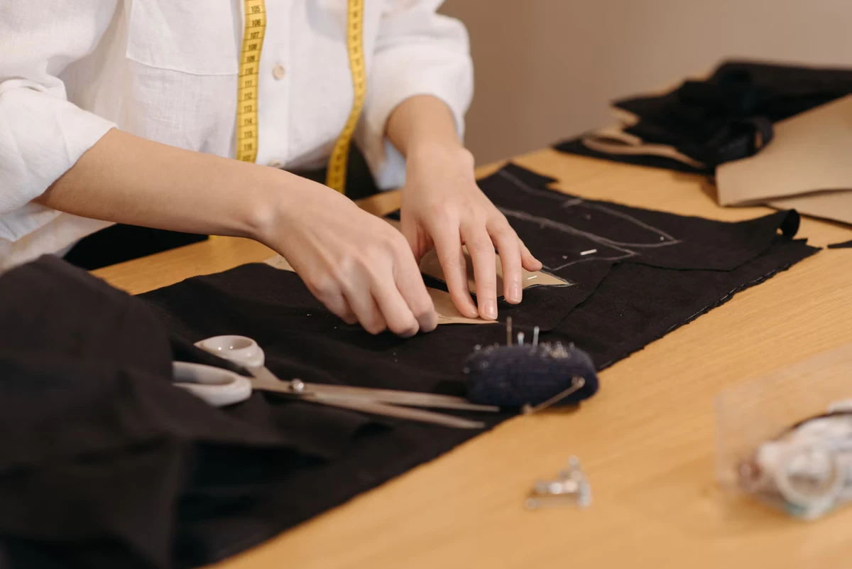 Local seamstress working with a client